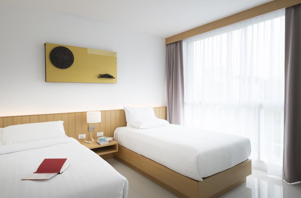 Modern Thai Suites Phuket Quarto foto